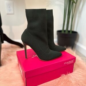 Olive green sock booties in size 8.5